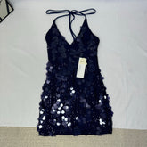 Two backless strapless dresses