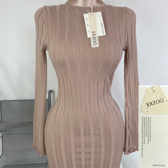 A fitted, ruffled edge knitted long dress