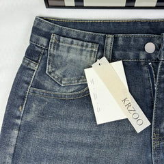Washed and distressed denim pants