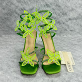 Floral snake-shaped strappy sandals