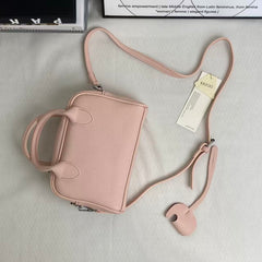 Litchi-patterned shell crossbody bag
