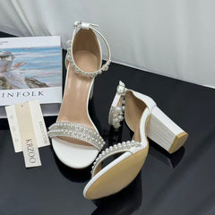 White ankle strap pearl necklace sandals