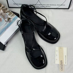 Crossed buckle leather high-heeled shoes