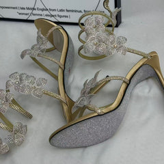Floral snake-shaped strappy sandals