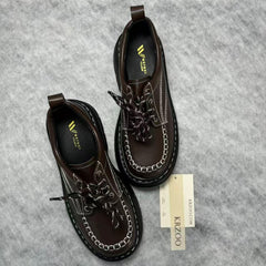 Sewn-on small leather shoes