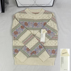 Openwork knitted sweater with patchwork top