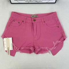 Jeans shorts with rolled hems and exposed pockets