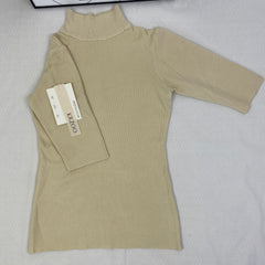 A fitted mid-neck knitted sweater