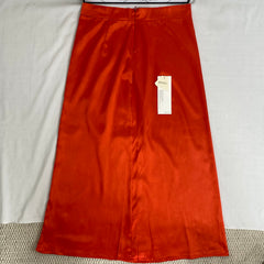 Half-length red A-line skirt