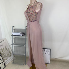 A halter-style and trailing evening dress
