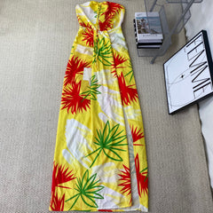 A strapless floral-printed halter dress