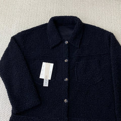 Collared single-breasted sheepskin coat