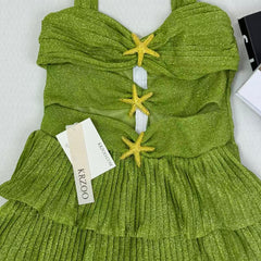 V-neck halter dress with sequins on the skirt