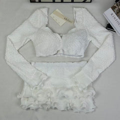 Blouse with wooden earflaps and half-skirt set