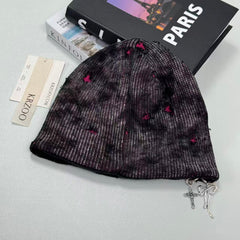 Cross-shaped hole distressed knitted hat