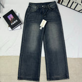Washed and distressed denim pants