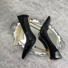 Metal tip black lacquered leather high heels
