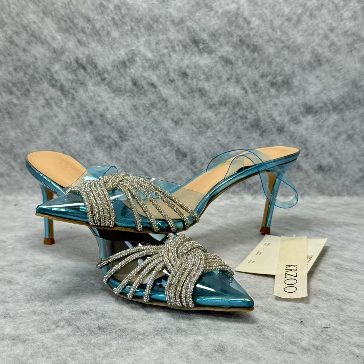 Pointed-toe transparent crystal high heels