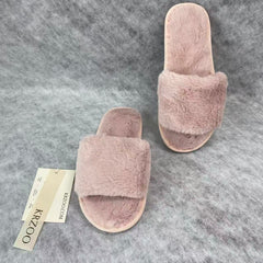 Soft plush slippers with short fur on the sole