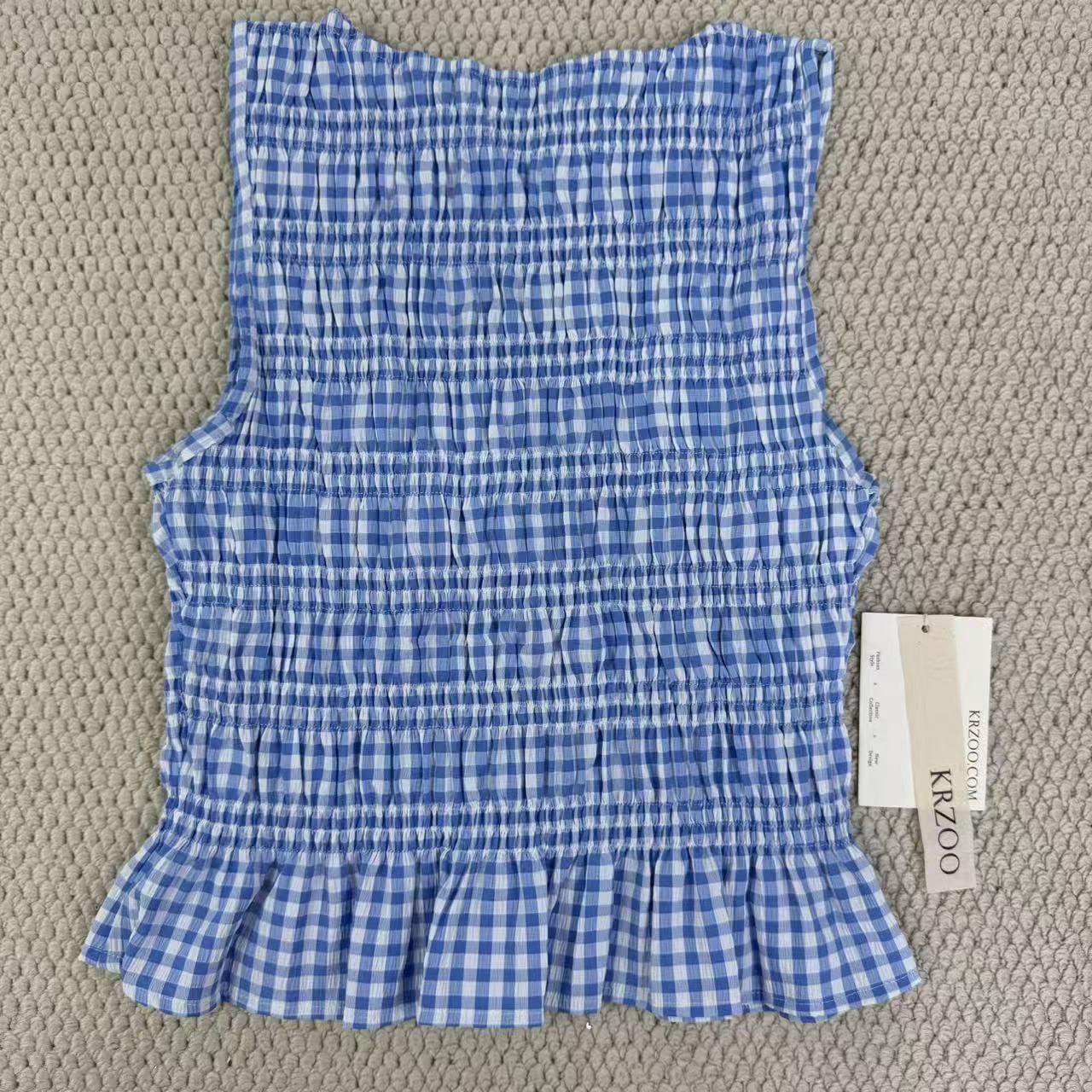 A sleeveless front-back vest