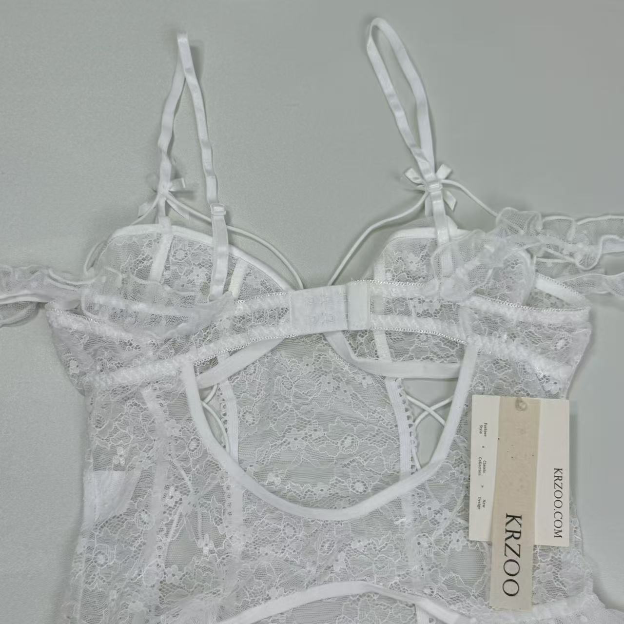 Backless and low-cut one-piece net-sheer uniform set