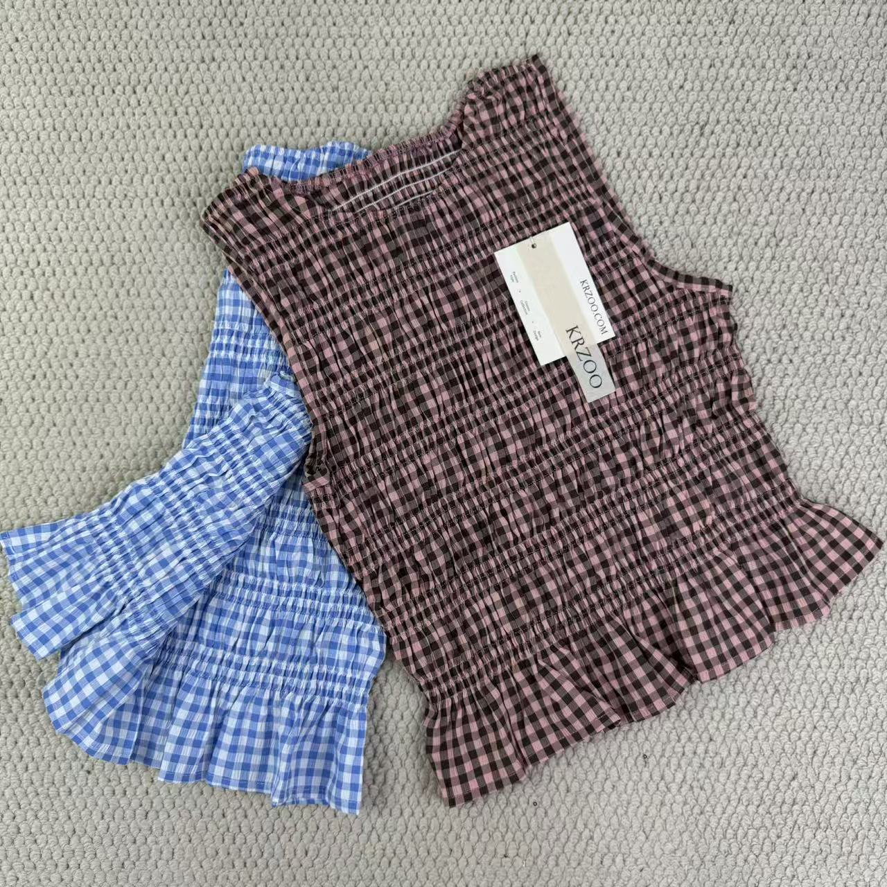 A sleeveless front-back vest
