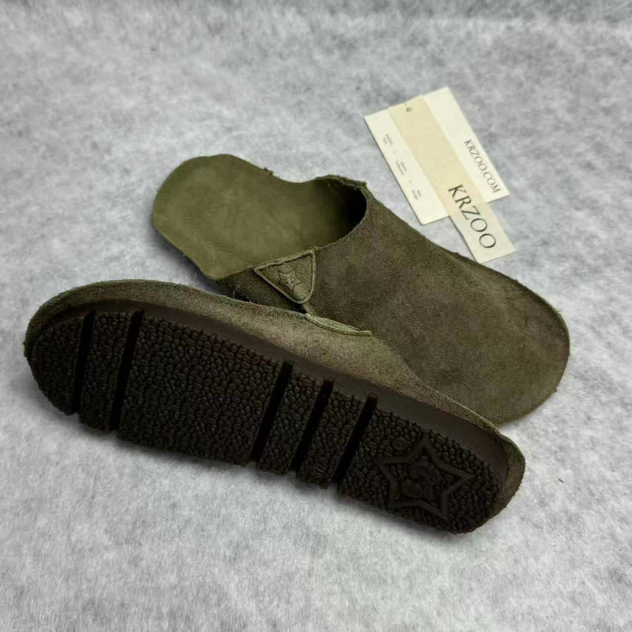 A pair of half-boots with a baggy top