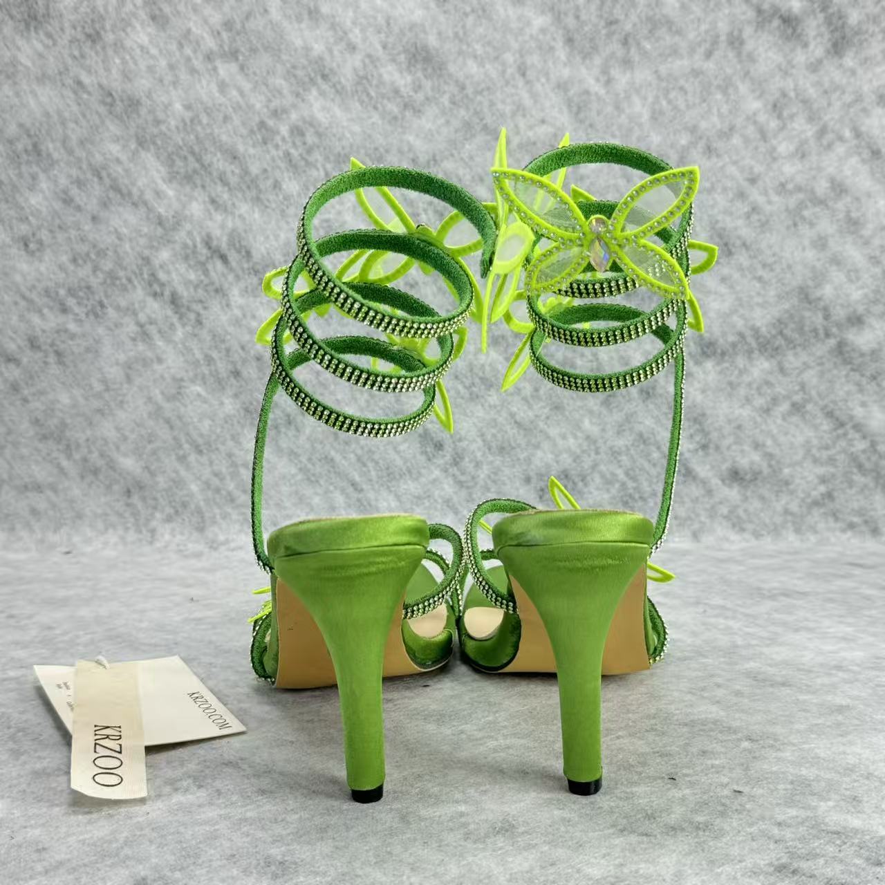 Floral snake-shaped strappy sandals