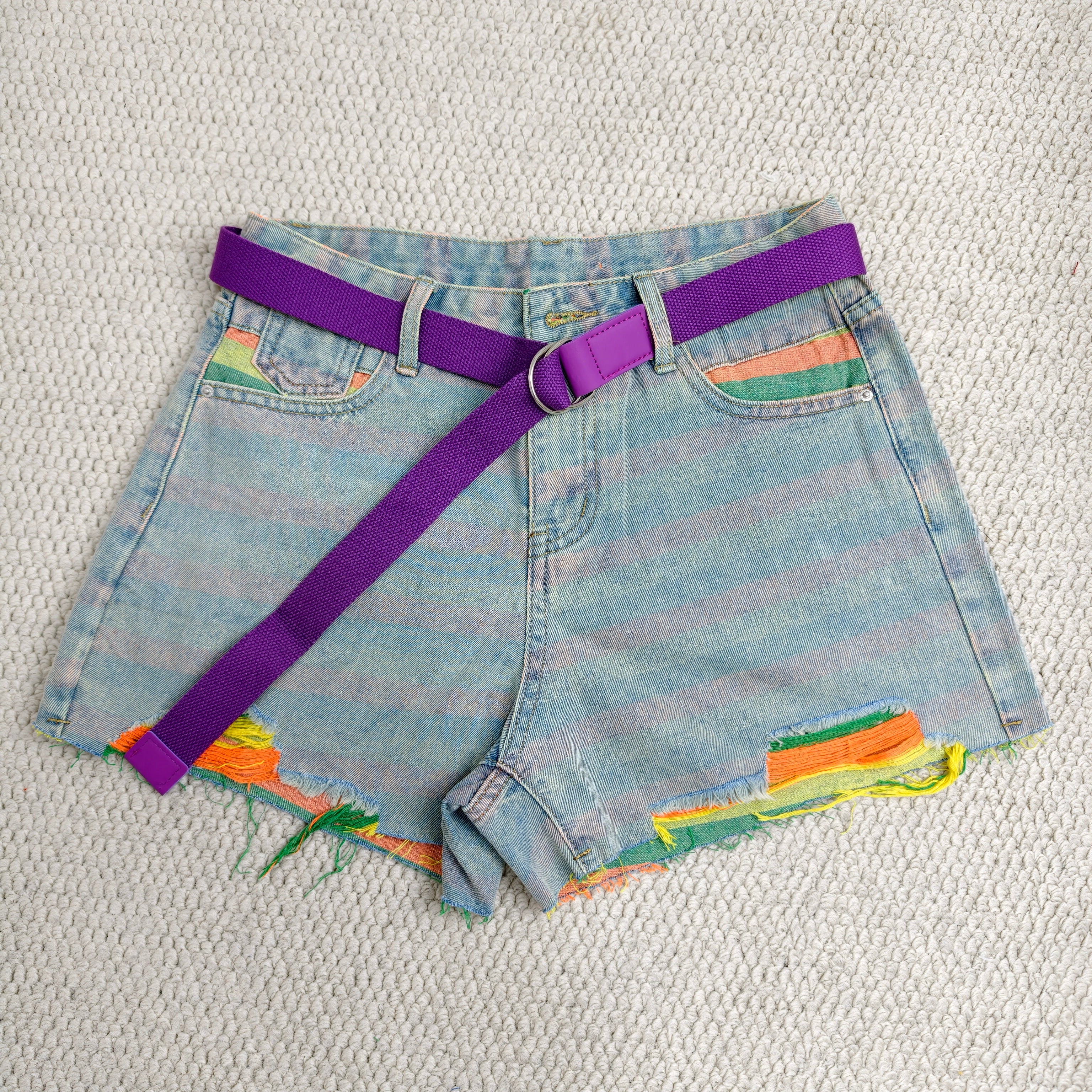 Striped holey denim shorts