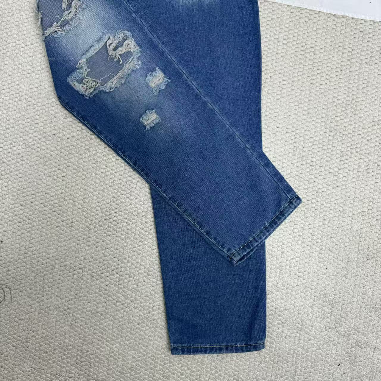 High-Waisted Ripped Jeans