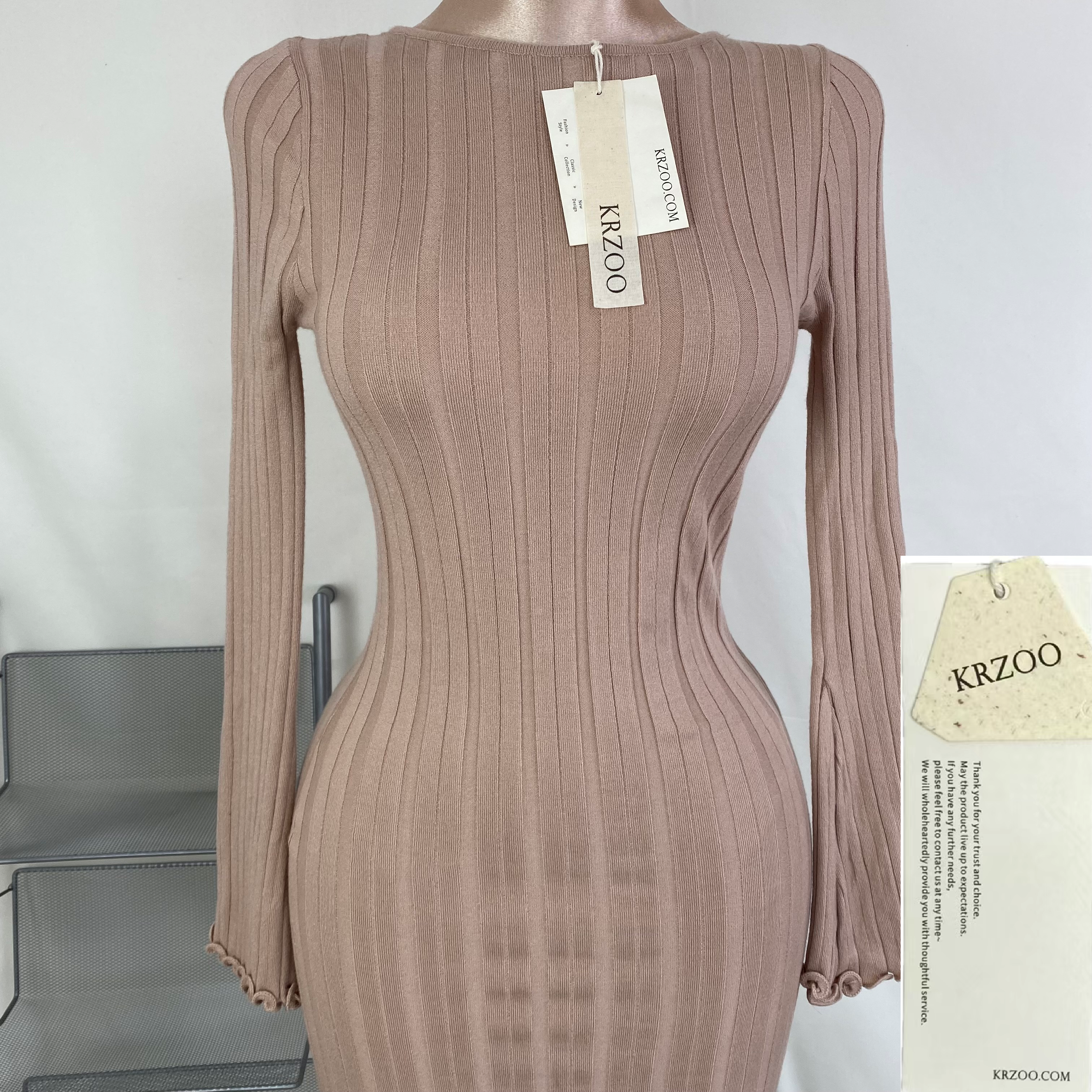 A fitted, ruffled edge knitted long dress