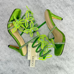 Floral snake-shaped strappy sandals