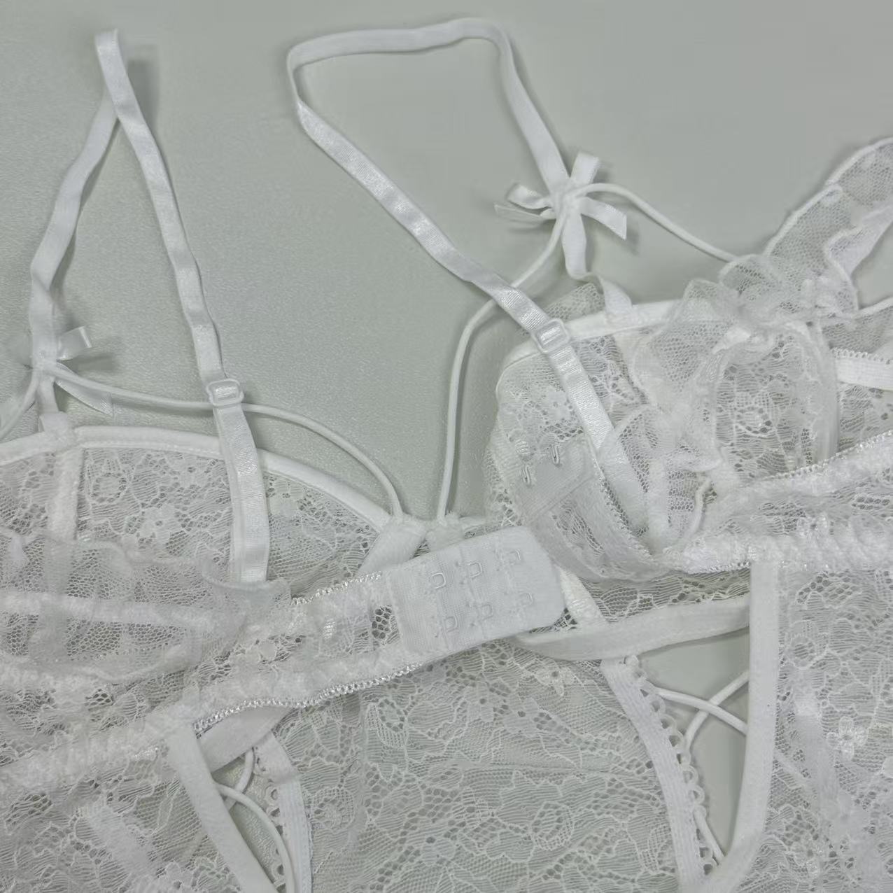 Backless and low-cut one-piece net-sheer uniform set