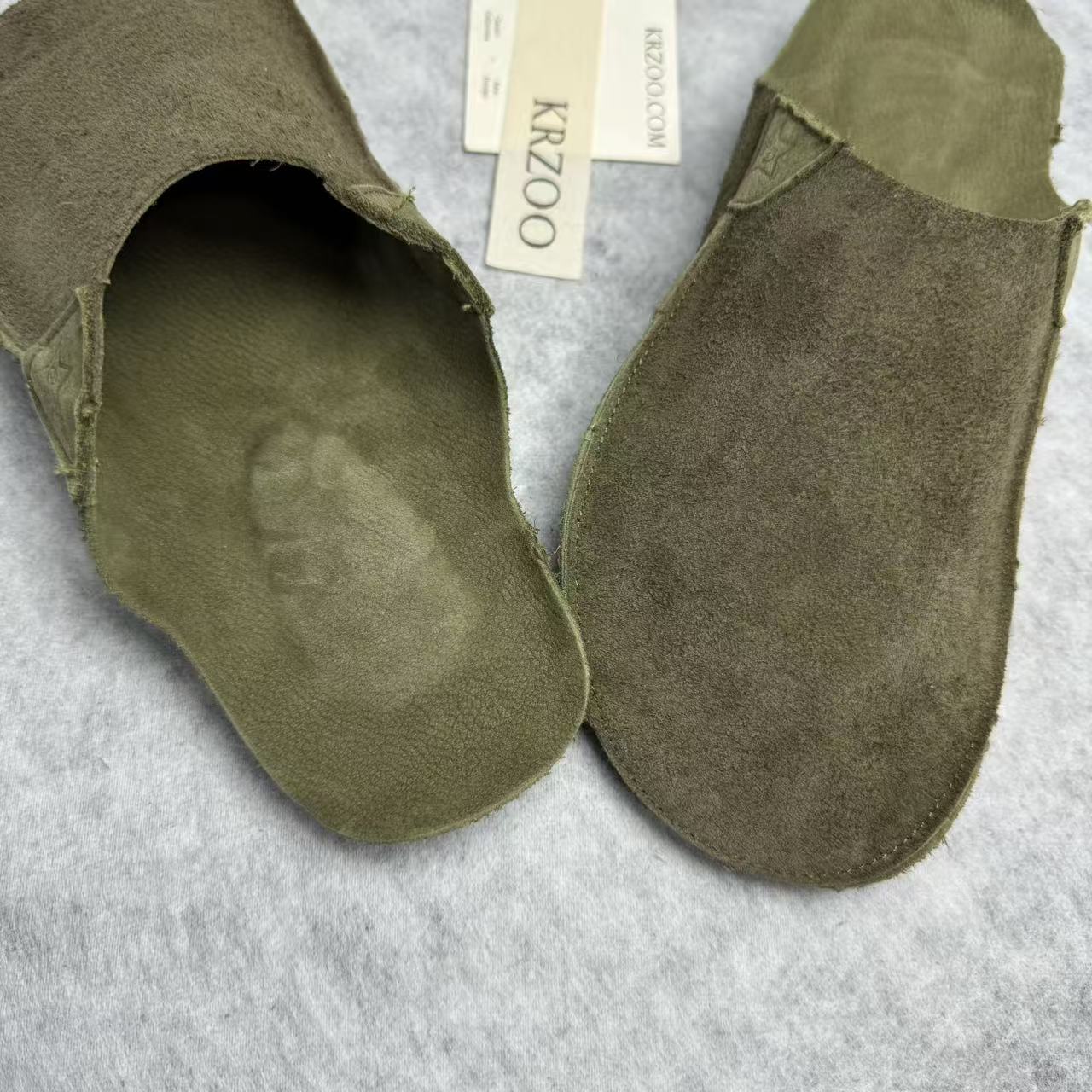 A pair of half-boots with a baggy top