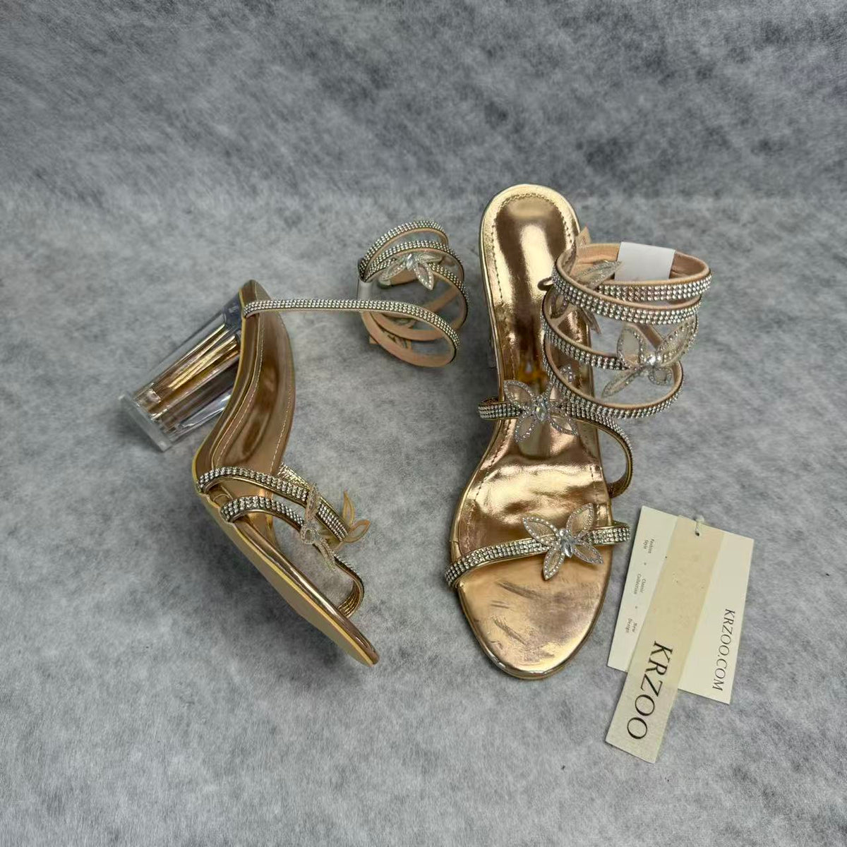 Serpentine-wrapped butterfly platform heels