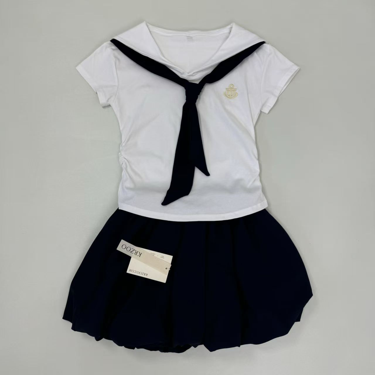 Two navy short-sleeved skirt in a set