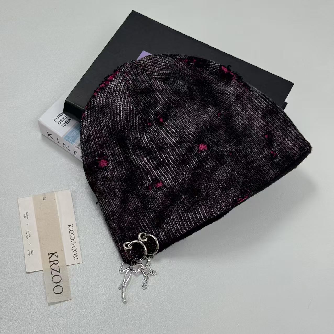 Cross-shaped hole distressed knitted hat