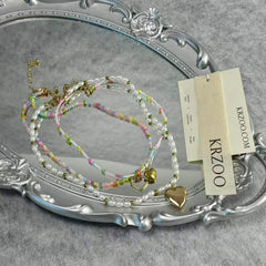 Love charm pendant string of pearls collar chain