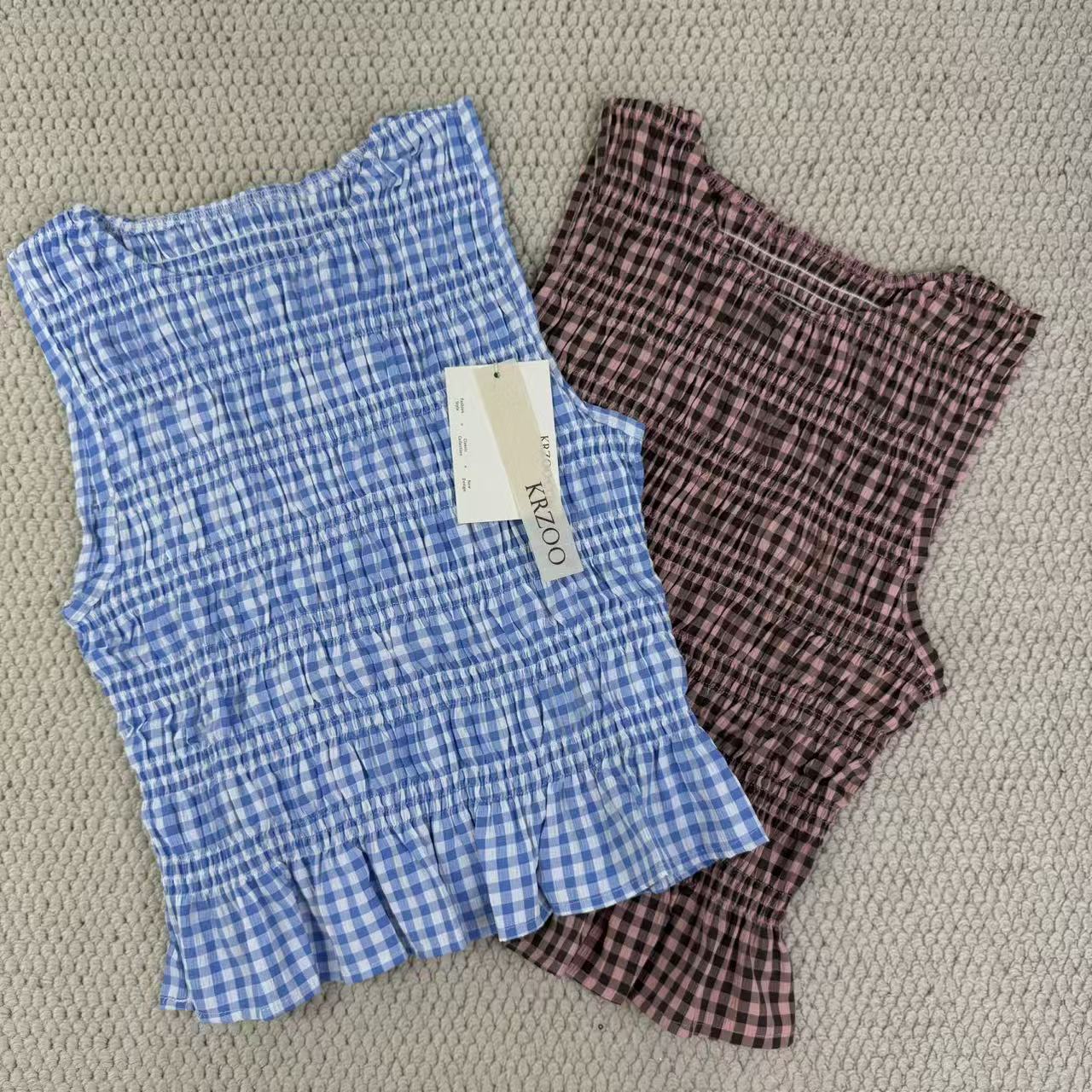 A sleeveless front-back vest