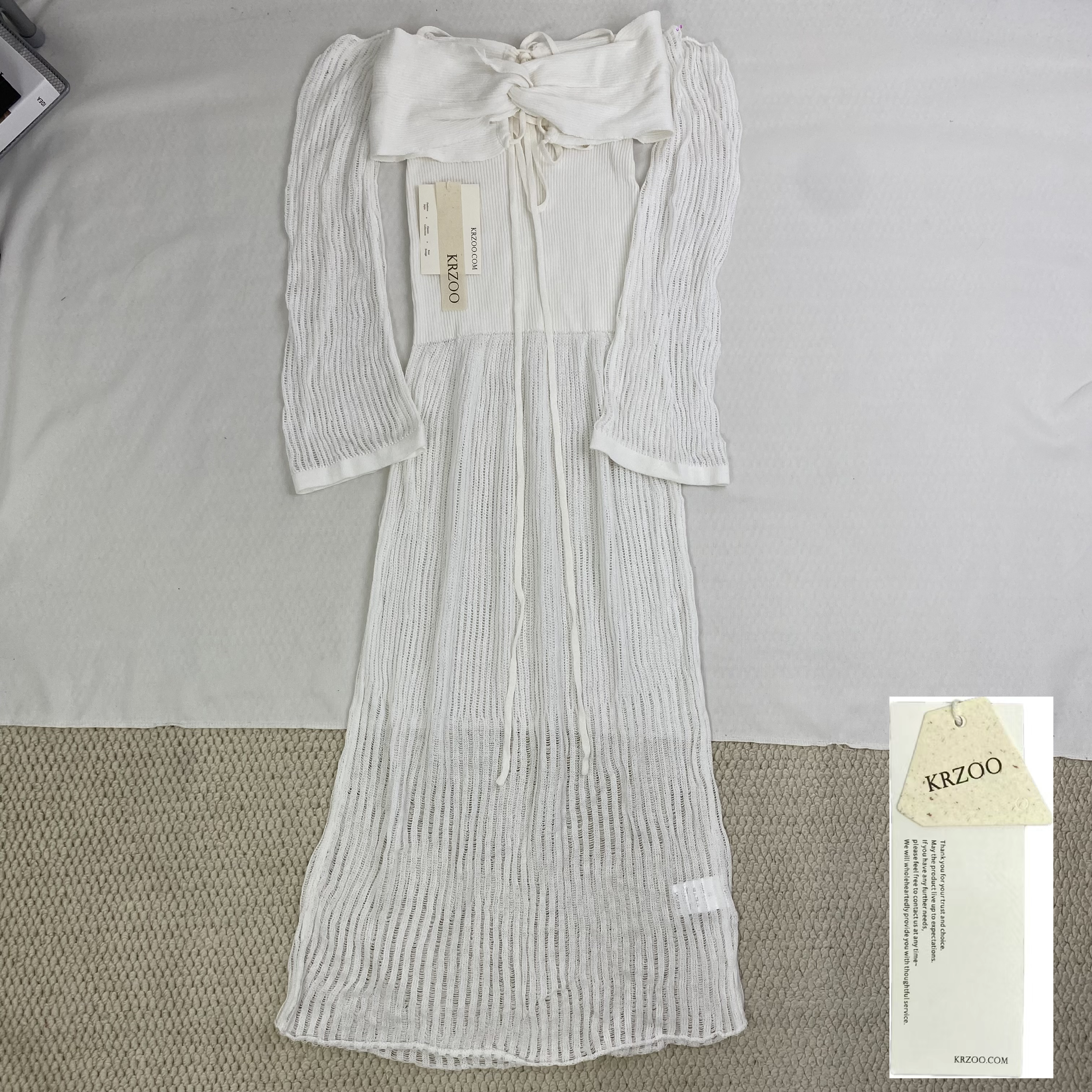 White knitted pullover sleeveless top