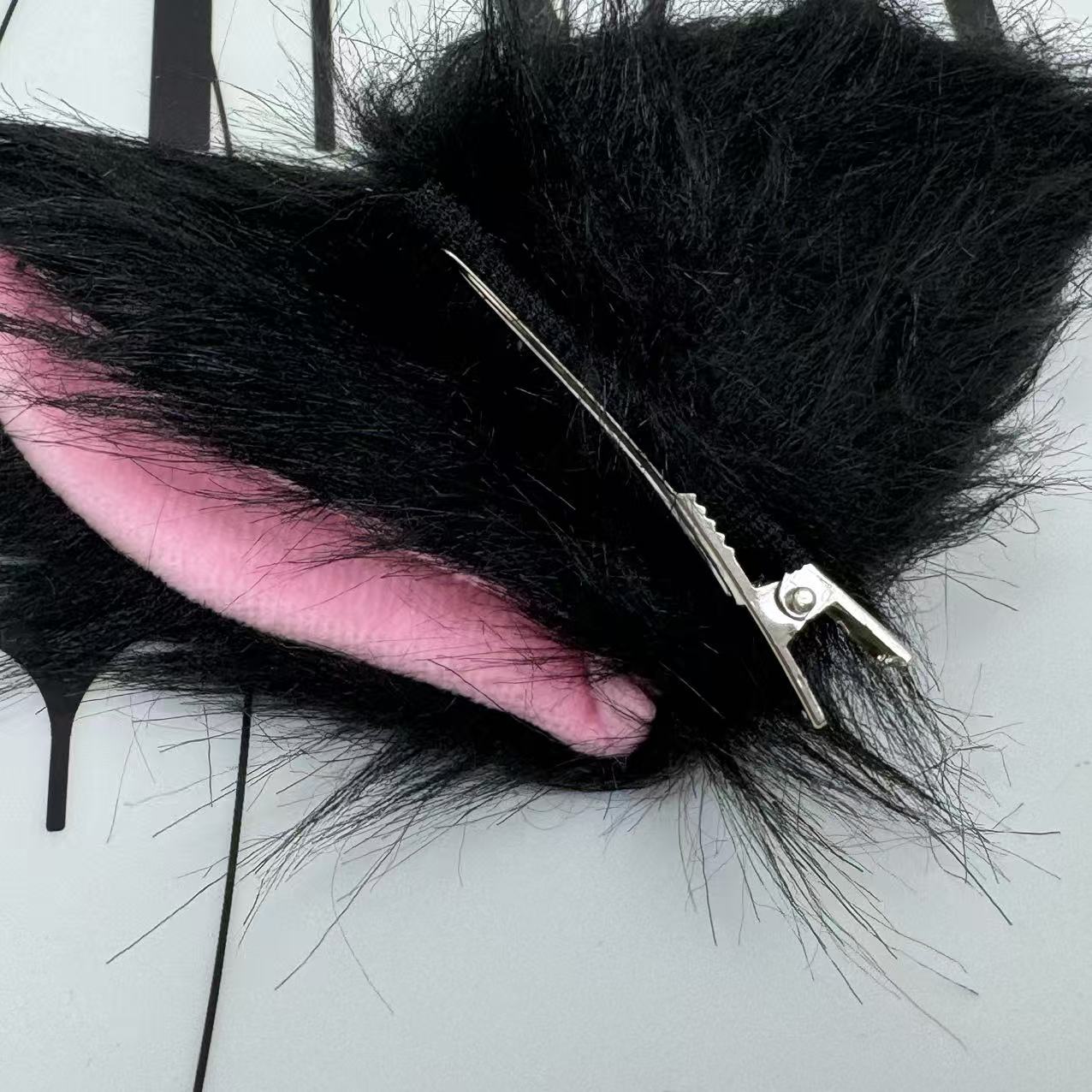Bows as hair clips for cat ears