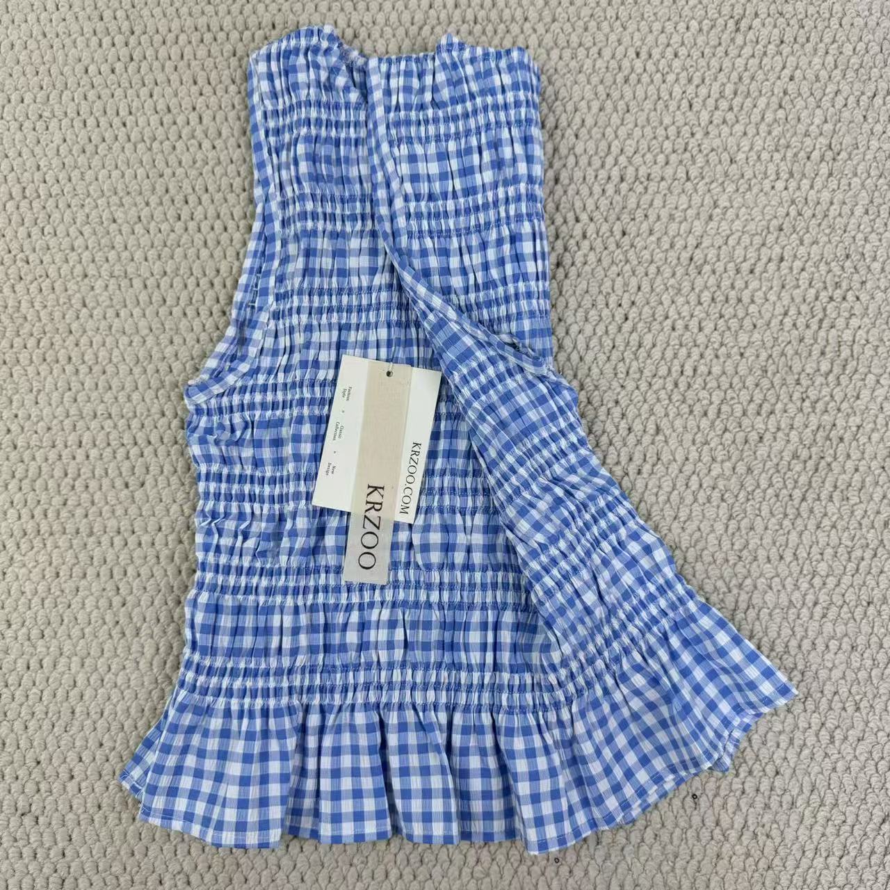 A sleeveless front-back vest