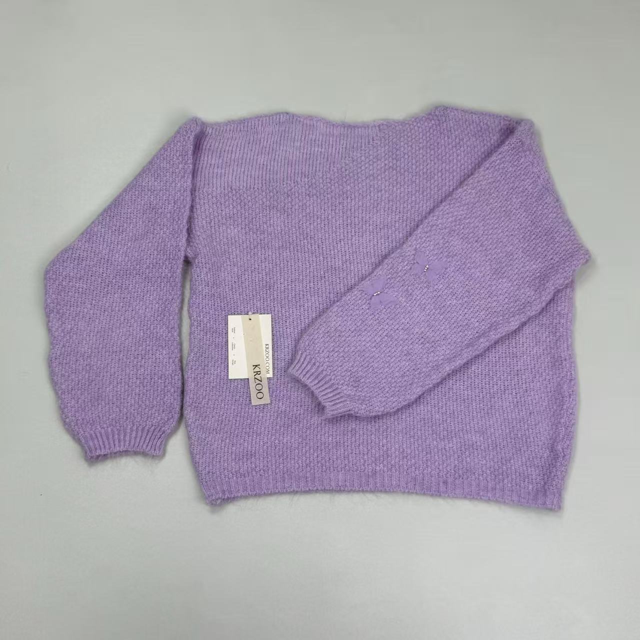 Three-dimensional netted flowered sweater