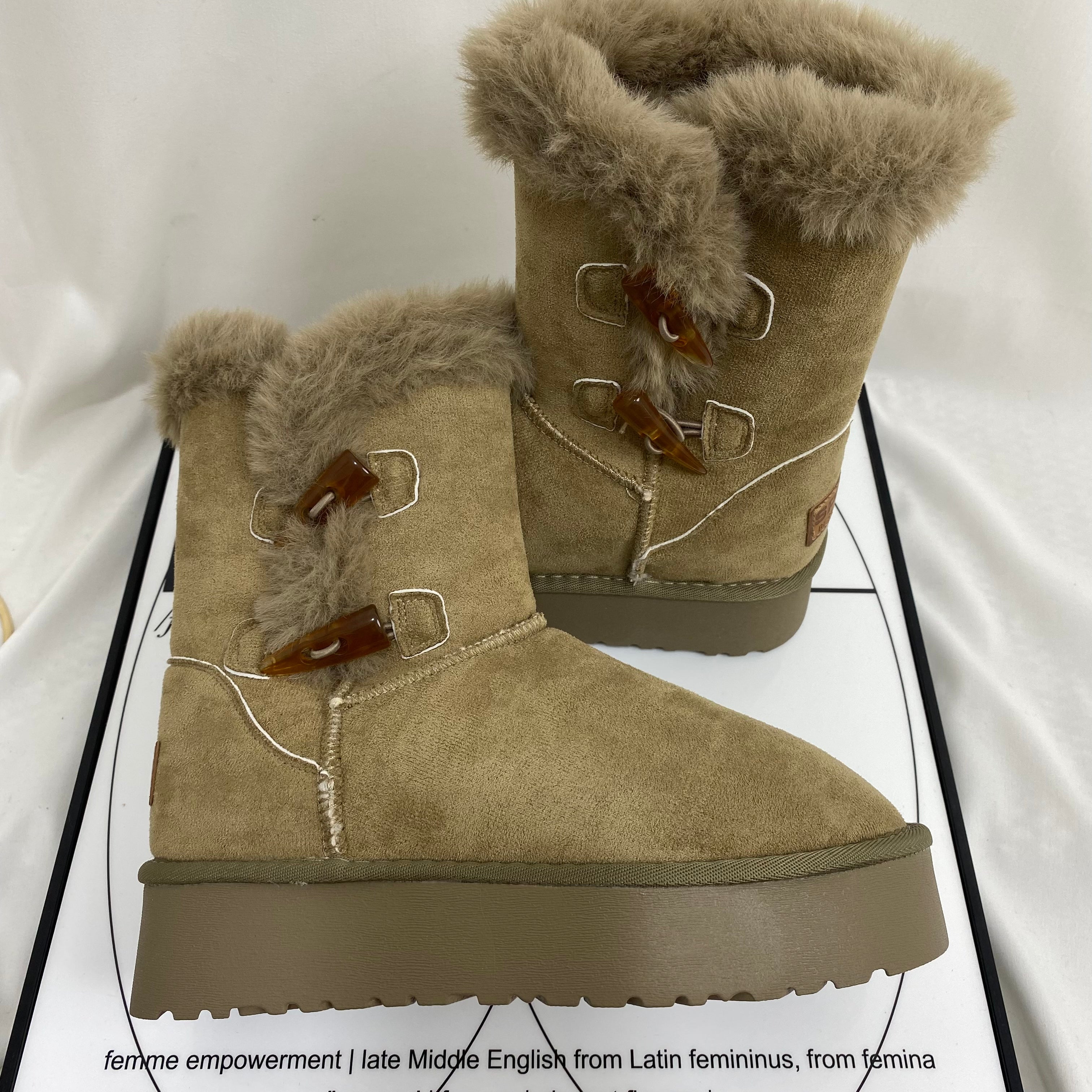 Shearling Horn-Buckled Snow Boots