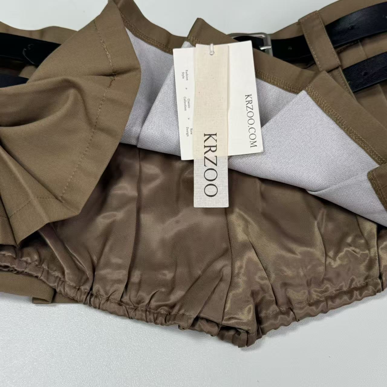 Double belt half-length pleated A-line mini skirt