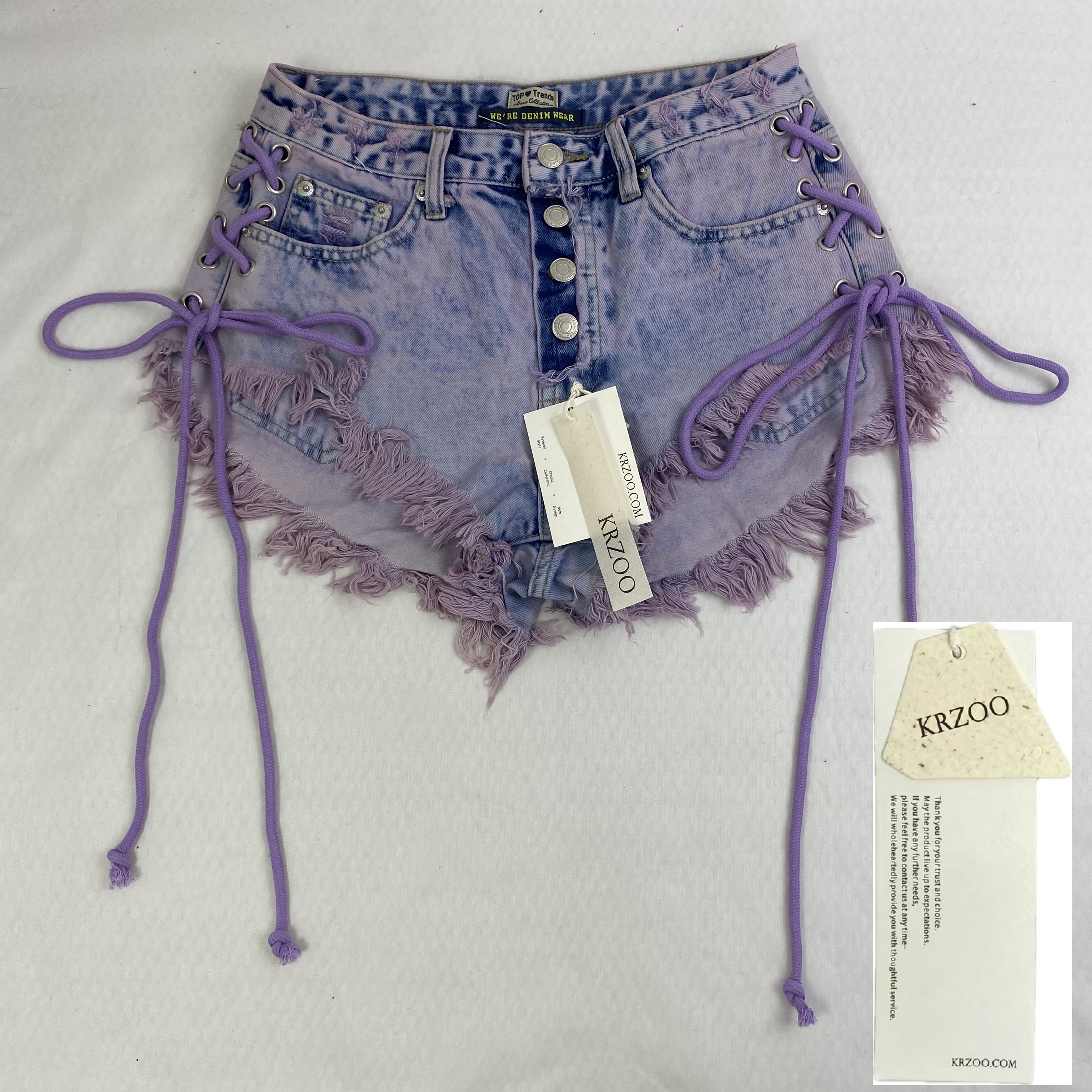 Purple strapped buttoned fringed shorts