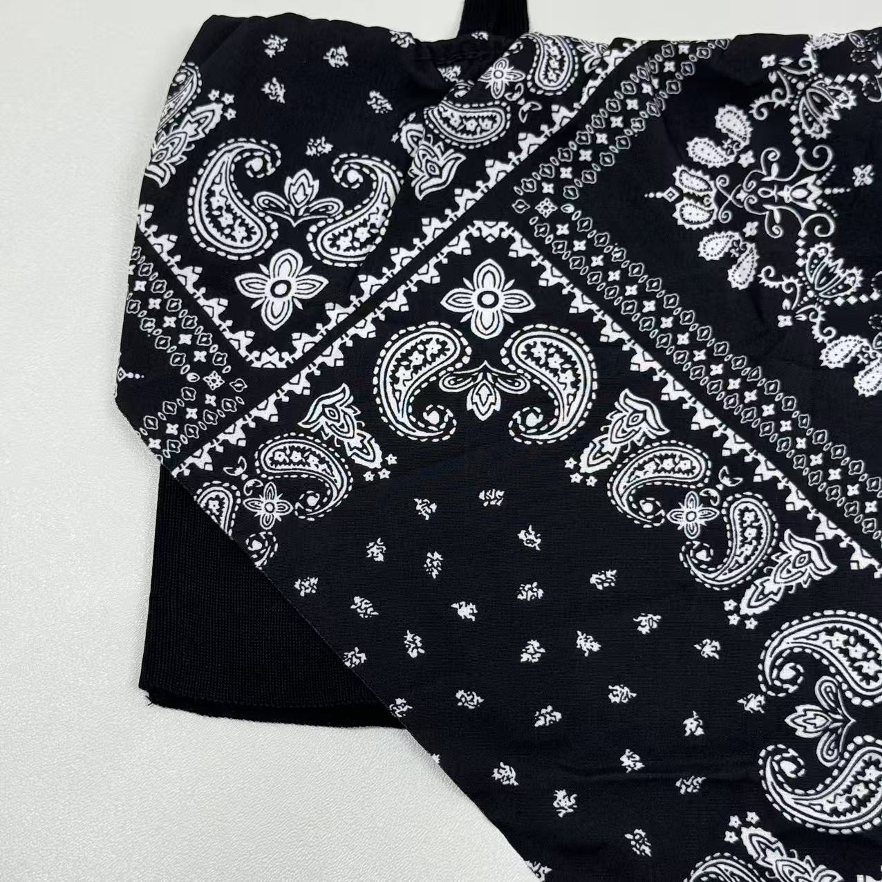 Strapless short-sleeved top with scarf design