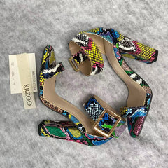 Snake-patterned chunky heels