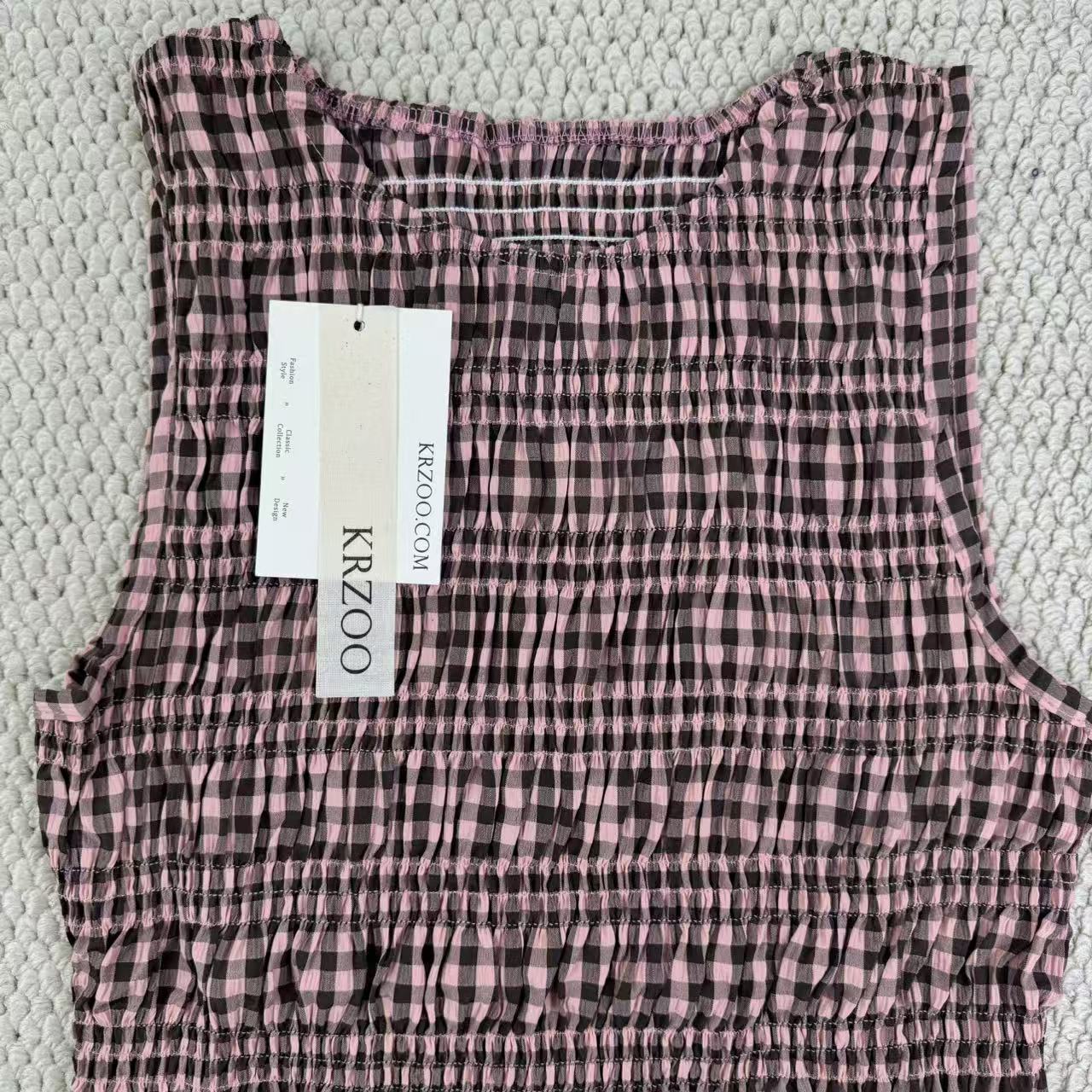 A sleeveless front-back vest