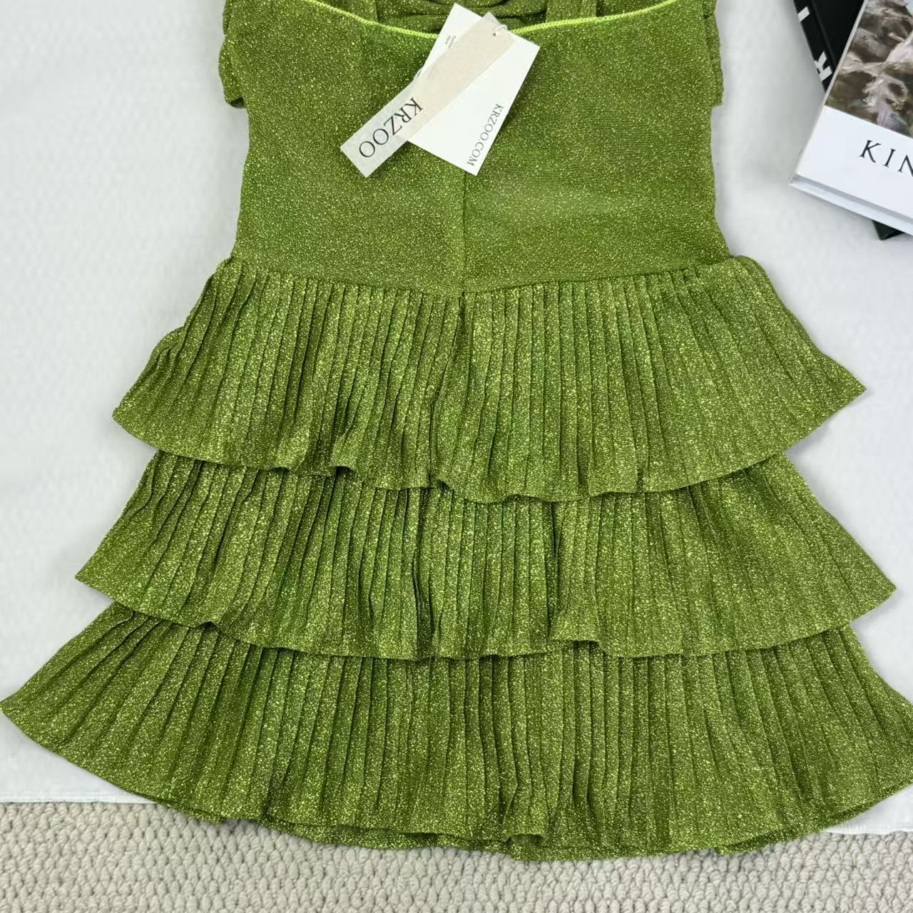 V-neck halter dress with sequins on the skirt